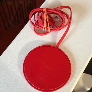 red wireless charging pad